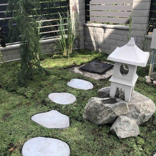 Japanese-style ornamental garden with a stone lantern (ishi-dōrō).