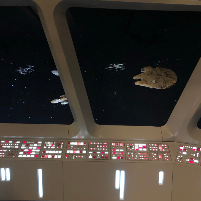 Star Wars exhibition installation: space battle with the Millennium Falcon, viewed from the command bridge of a Rebel capital ship.